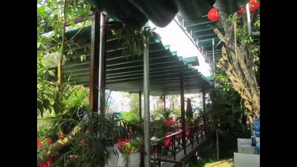 mai-xep-di-dong-hoa-phat-7 mái bạt xếp mầu xanh che nắng cho quán